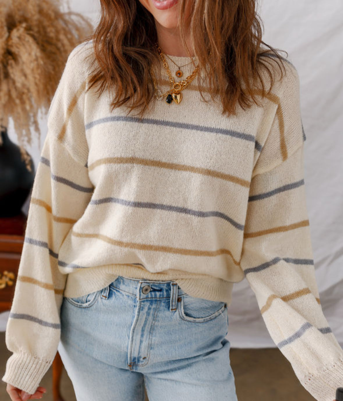 Ivory sweater with thin mocha and gray stripes