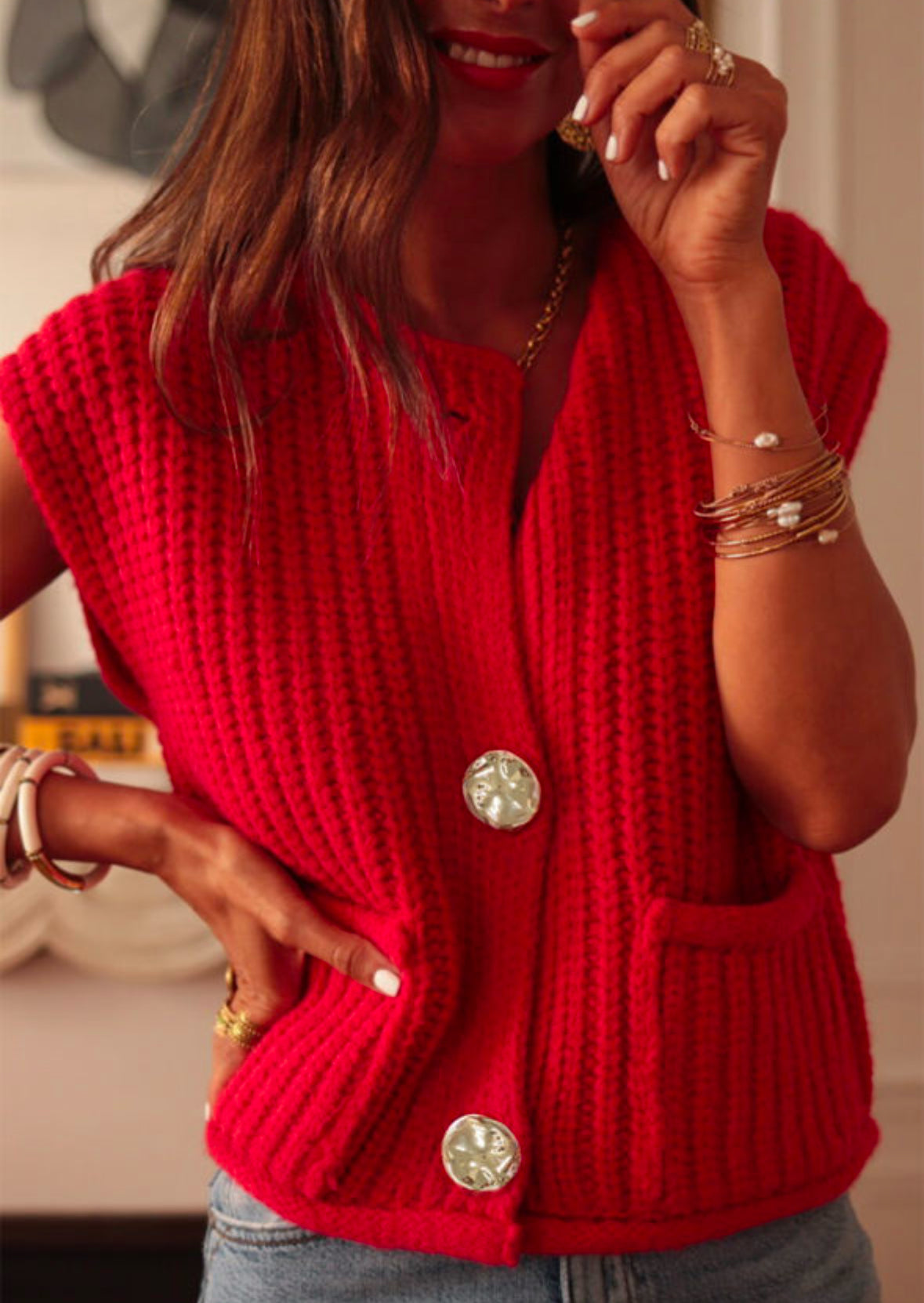 Red sweater gold buttons
