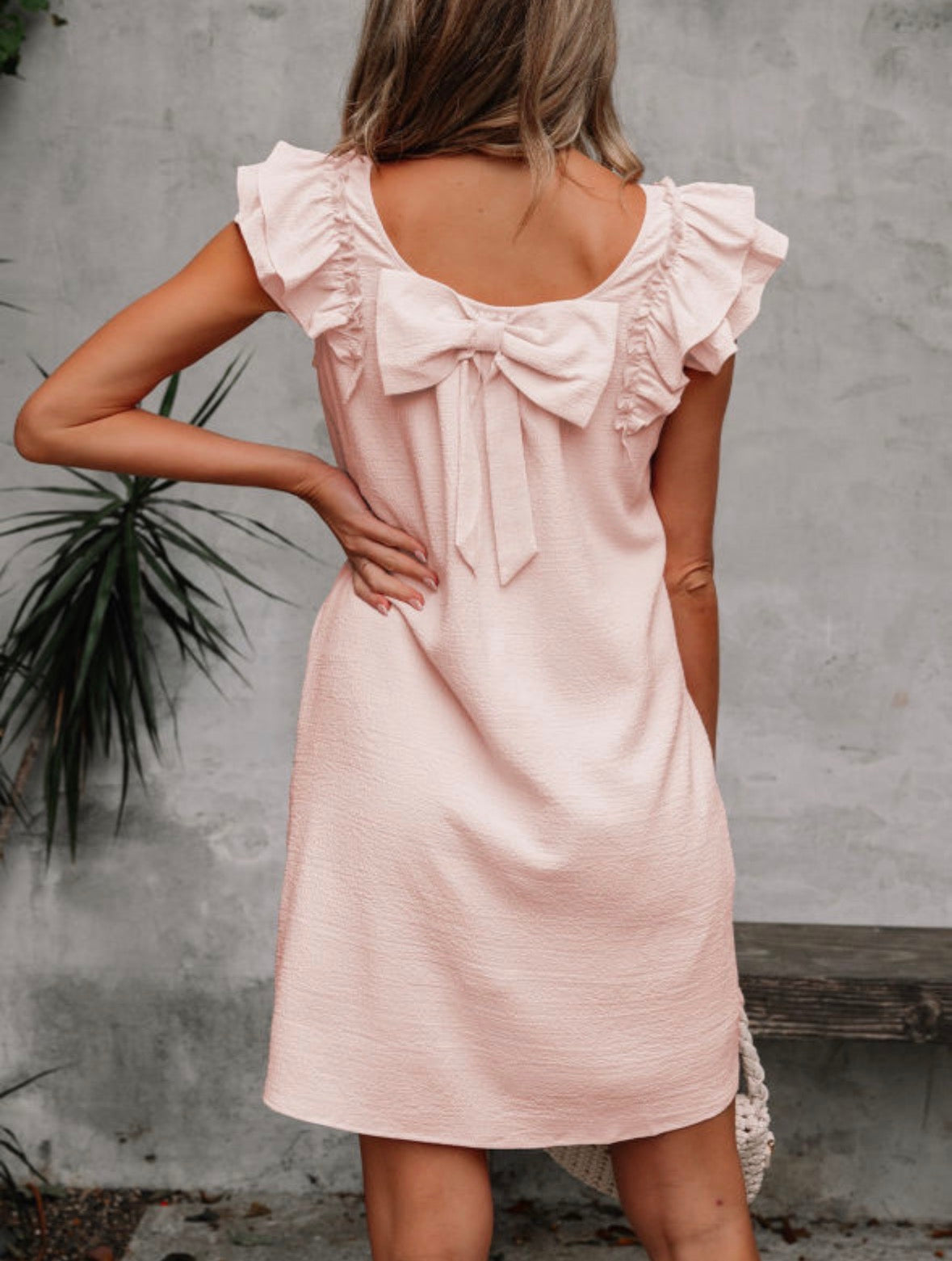 Pink bow back dress