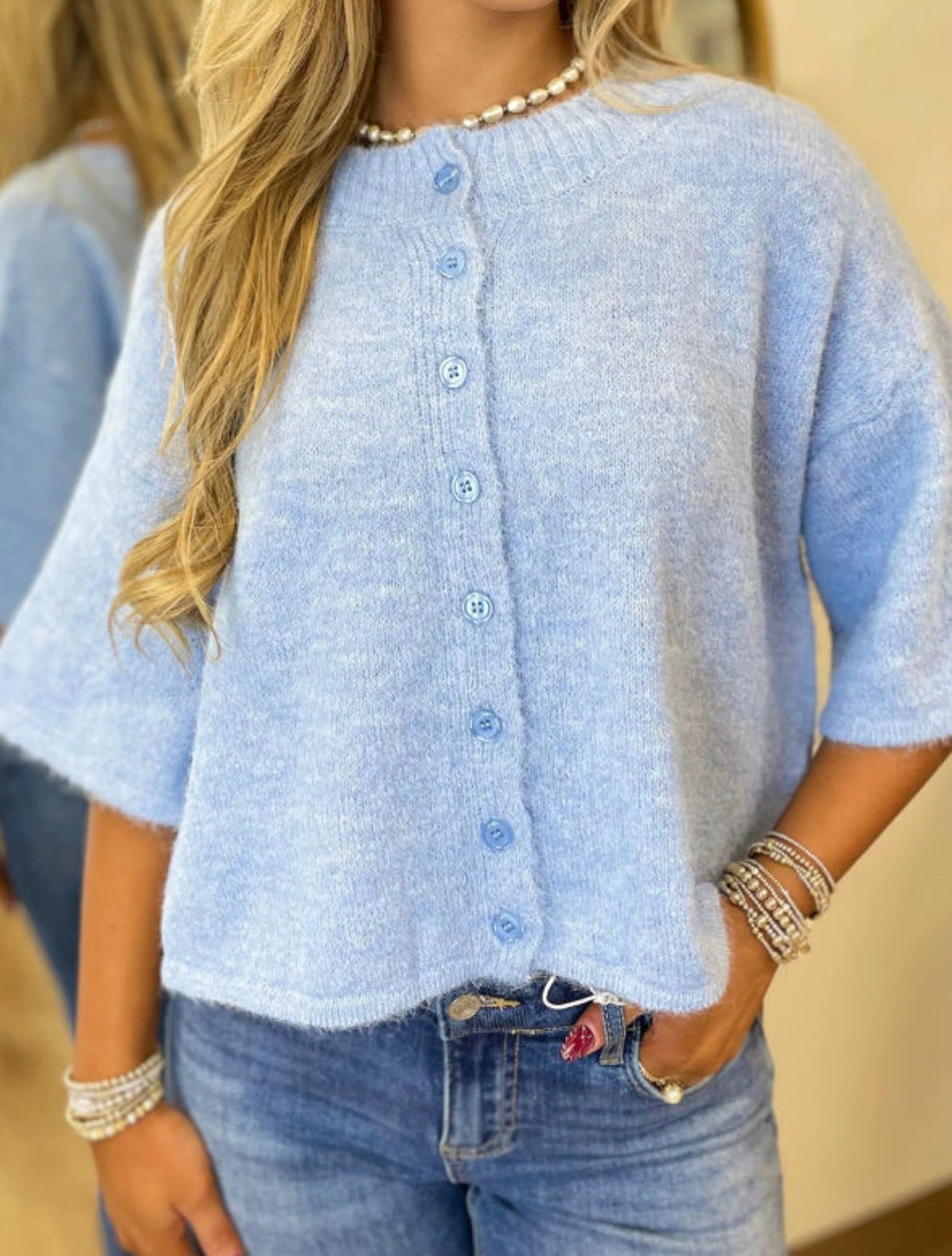 Blue button up sweater