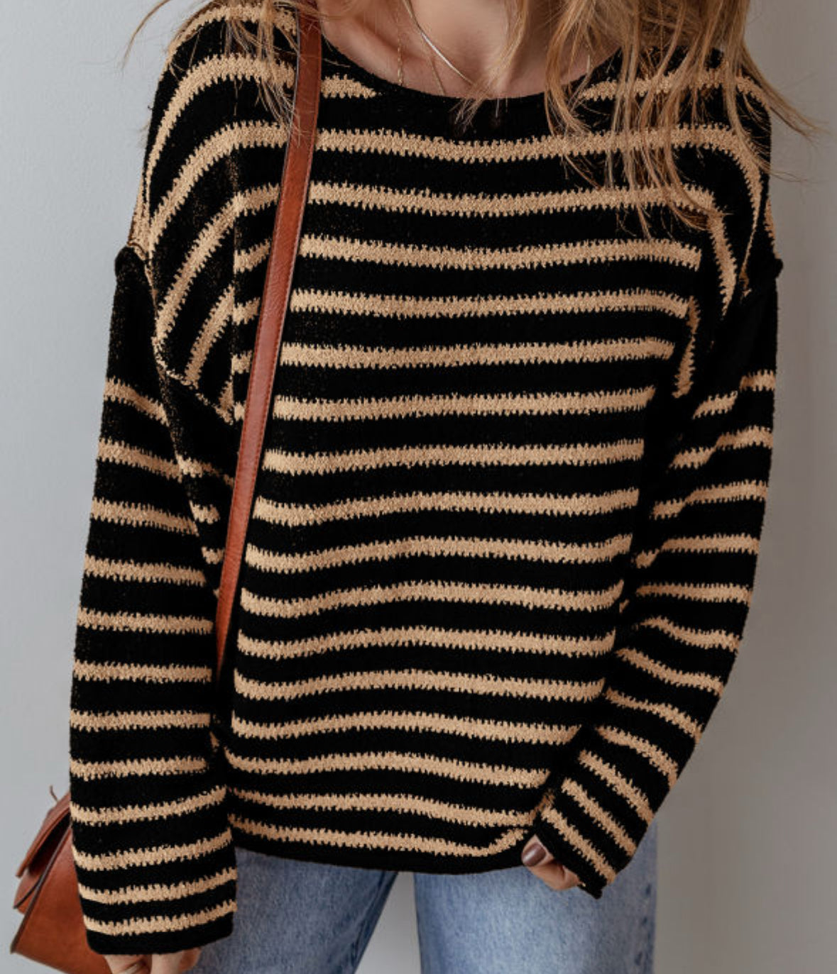 Black sweater with thin khaki striped