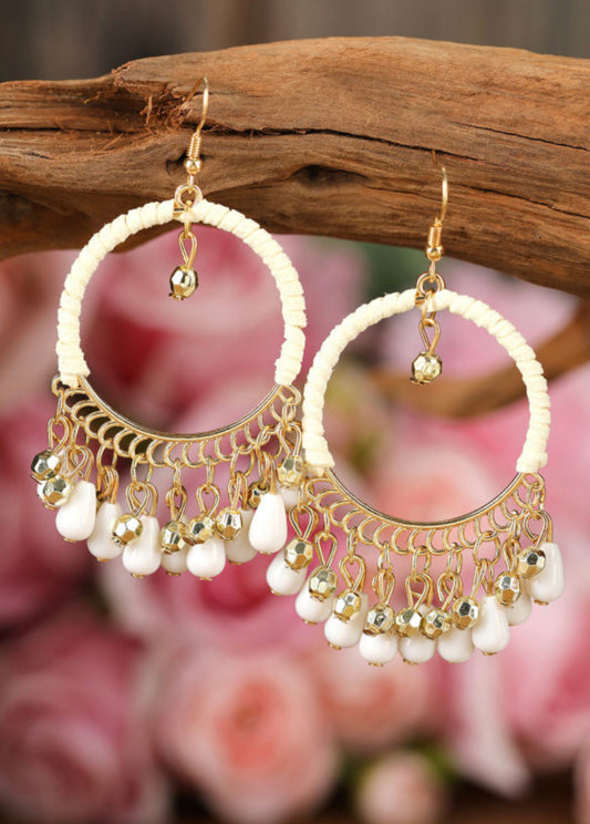 Gold bauble earrings
