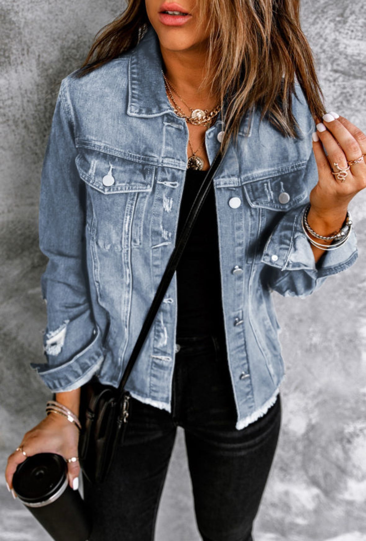 Distressed denim jacket