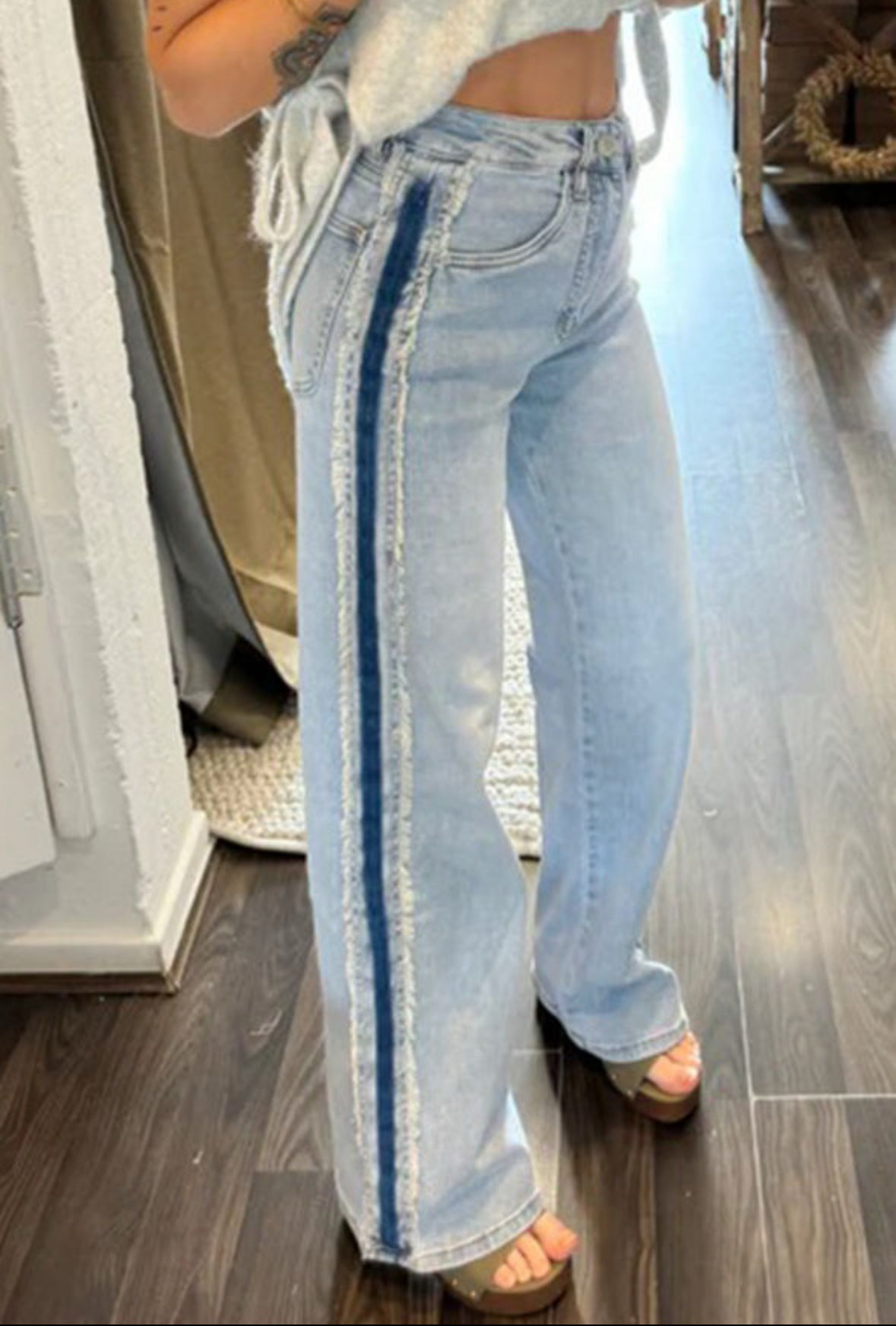 Lightwash denim with dark stripe